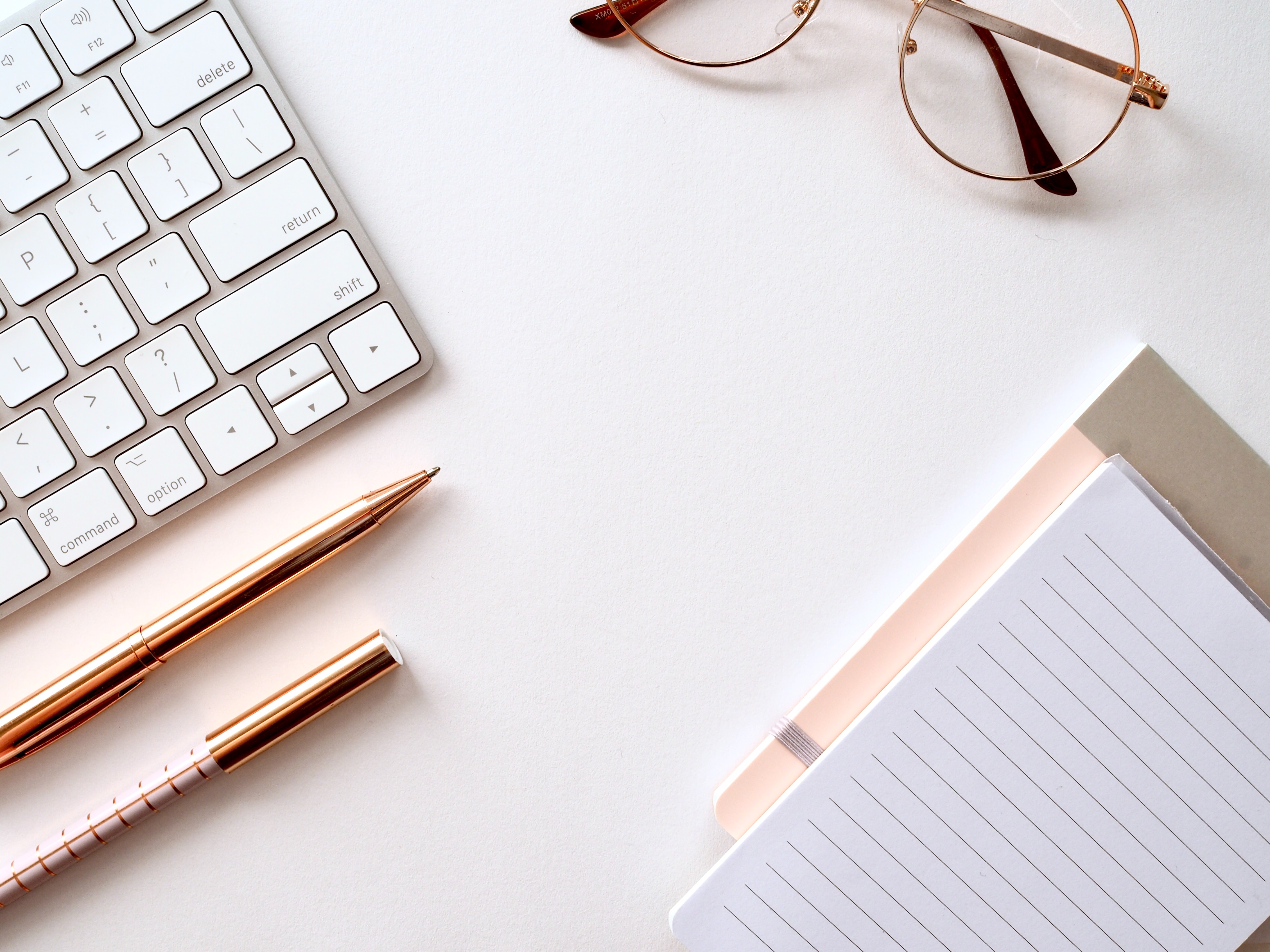 Notepad and pen on desk